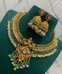 Rice Pearl Jalebi Necklace with Peacock Pendent in Kundan - KN00384