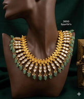 Jadau Double Leaf Necklace in Gold Polish - KN00590