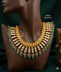 Jadau Double Leaf Necklace in Gold Polish - KN00590