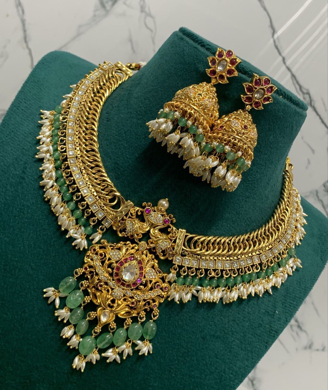 Rice Pearl Jalebi Necklace with Peacock Pendent in Kundan - KN00384