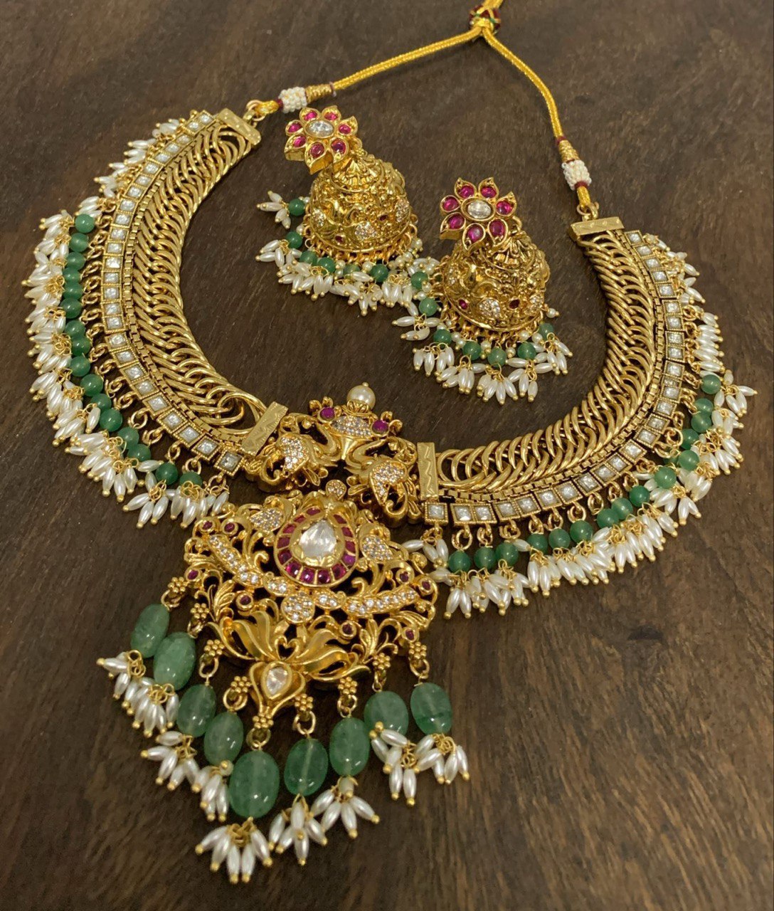 Rice Pearl Jalebi Necklace with Peacock Pendent in Kundan - KN00384