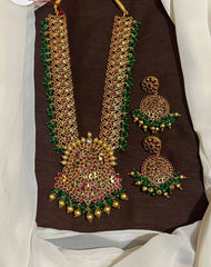Kempu Stone Grand Haram With Peacock Pendant and Grand Earrings - NH00335