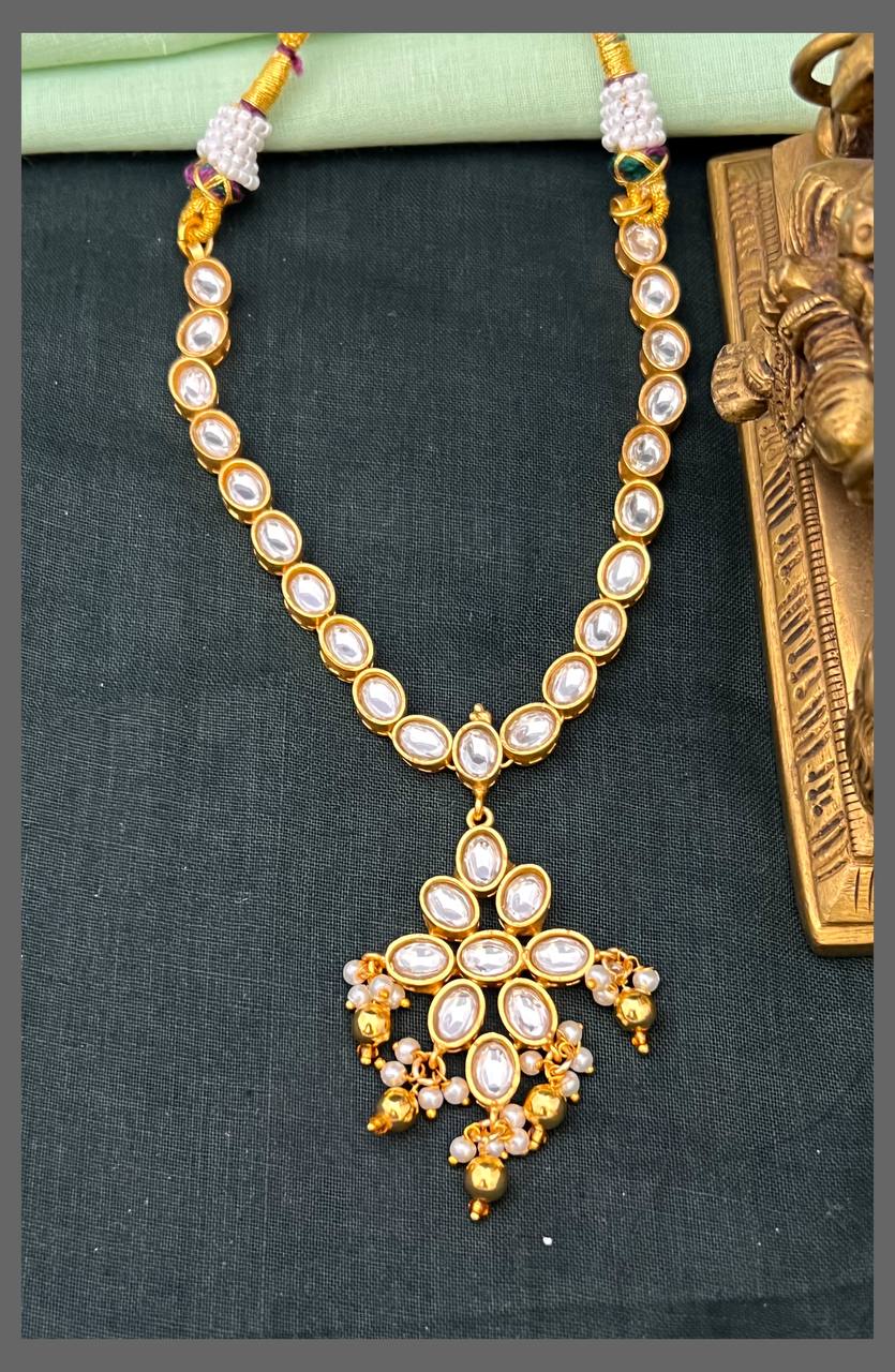 Beautiful Stone Necklace with Flower Pendant in Kundan - KN00570