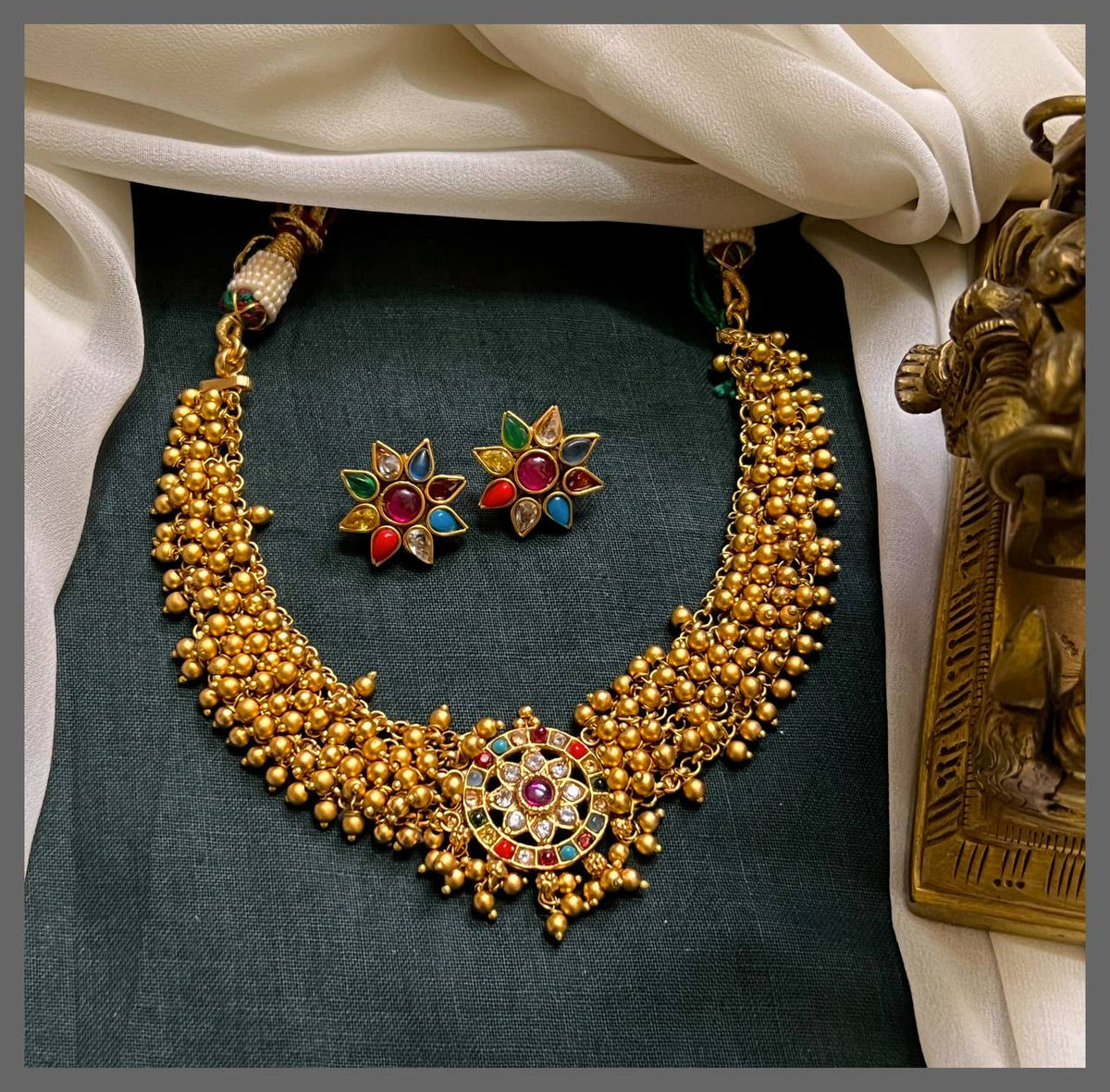 Small Pearls Necklace With Navratna Stone Flower Pendant In Nakshi - NN00737