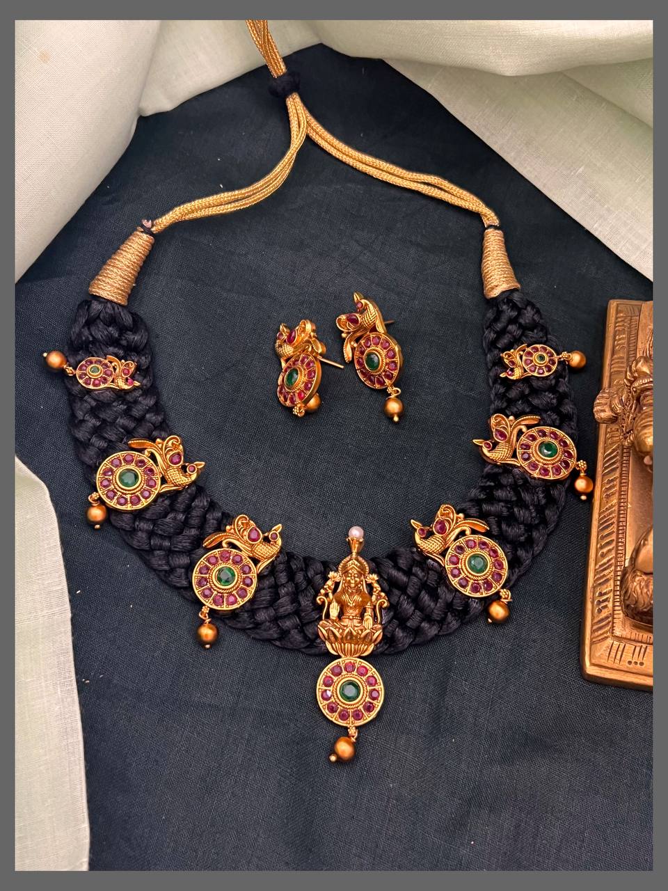 Beautiful Lakshmi and Peacock Pendant In Black Dori - BD00125