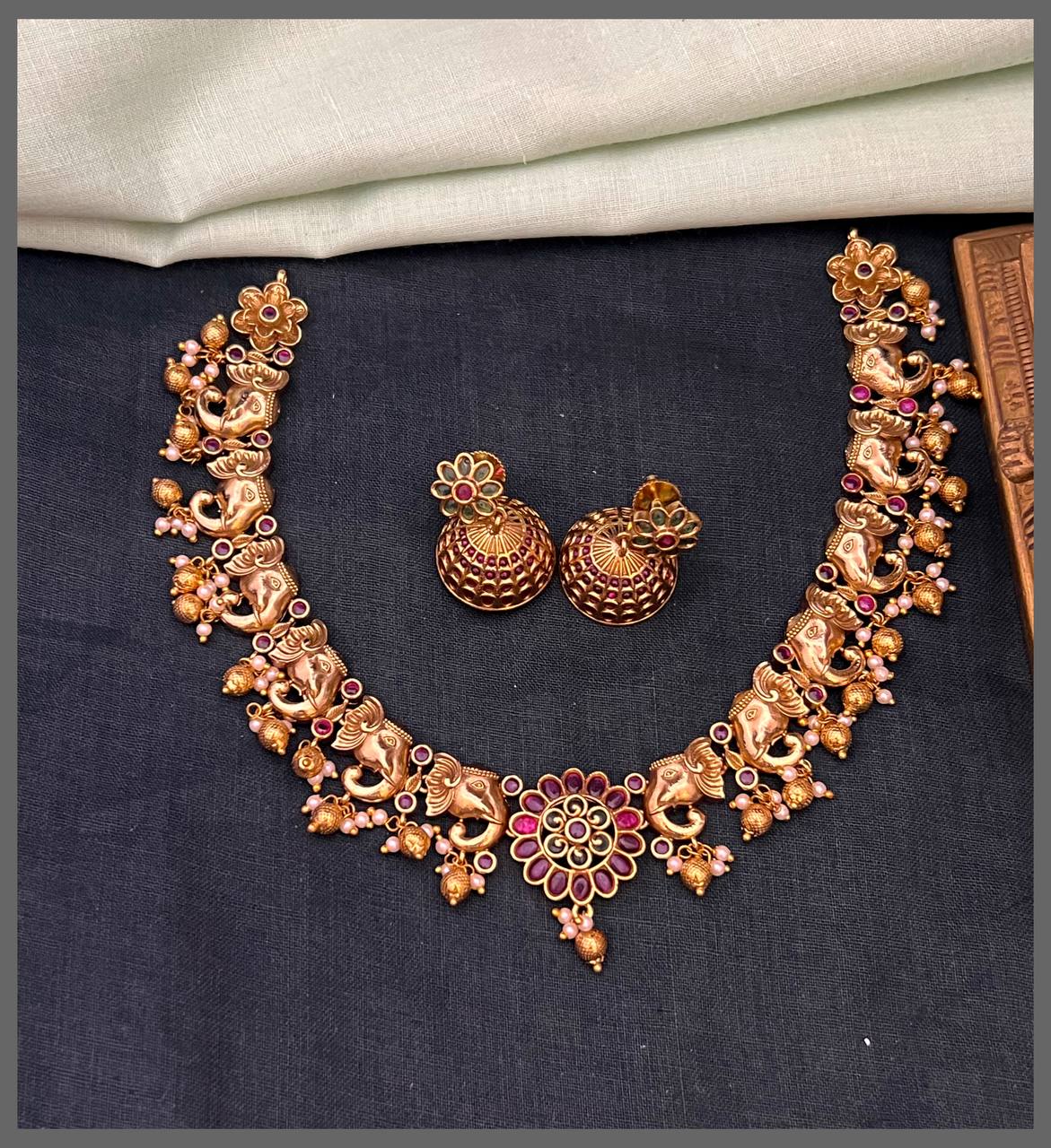 Elephant Necklace with Ruby Flower Small Pendant in Nakshi - NN00829