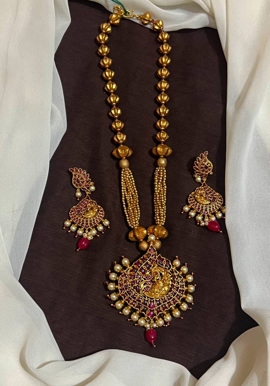 Antique Polish Peacock Pendant With Ruby Bead - NH00507